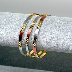 Gold plated bangles / bracelets, set of 3
8.5” 
New, Never worn